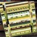 On Sale, Price Reduced. Patchwork Lap Quilt, with Moda's Origins Fabric, Earth Tones ....pattern also for sale