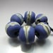Handmade Lampwork Rough Rock Beads by GlassBeadArt ... Purple and Silvered Ivory ... SRA F12 ...9x9mm