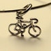 Sterling silver hand stamped bangle with bicycle charm