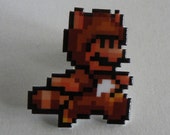 wanna buy a squirrel - super mario 3 tanooki pin