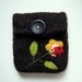 Pretty hand knit dark brown felted pouch cellphone cozy with a happy little ladybug
