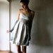 Formal dress in ecru silk and linen