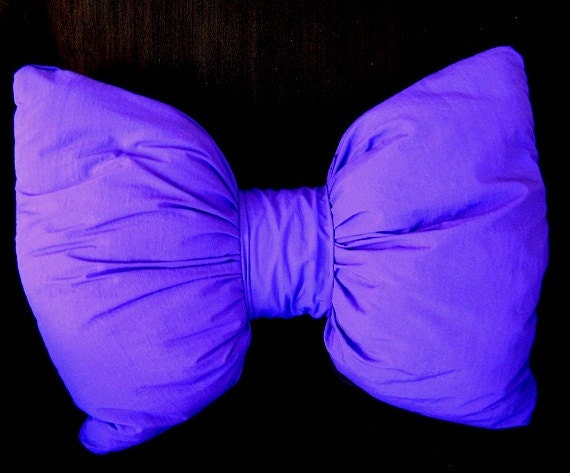 Bow shaped decorative pillow in neon purple violet teen women