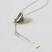 magic is something you make - sterling silver fortune cookie lariat with fortune message in front