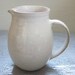 small white creamer - 3 inches tall