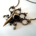 Gothic Jewelry, Brass Knuckles and Raven Skull Necklace, Bird Skull Pendant,Crystal Clear Jewels, Gothic Style
