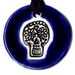 Calavera or Sugar Skull Ceramic Necklace In Midnight Blue