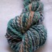 Handspun yarn from Merino wool, Sandia. Worsted weight, 0.8 oz (24 g), 46 yds (42 m)