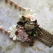 Great Horned Owl Surrounded With Beauty Necklace Vintage Jewelry Gold Statement Lacey Rhinestones Hooter Wise Bird Whimsical Flowers Nature Beauty Stylish Elegant Feminine Woman Girly Wings Feathered Forest Watching Nocturnal Night Branches Victorian