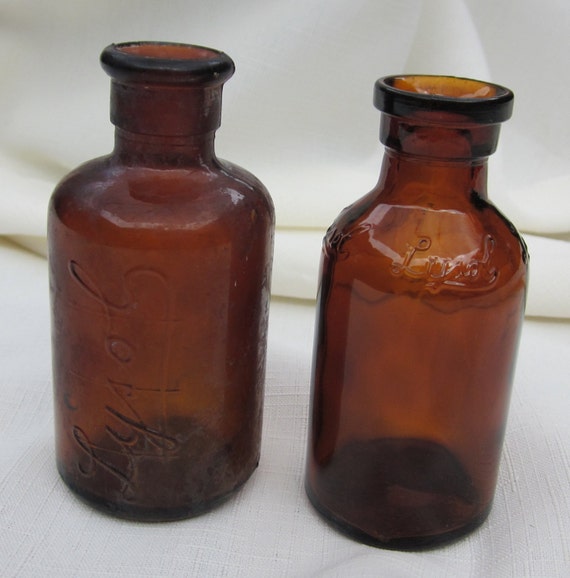 LOT of 2 Antique Amber Colored Lysol Bottles Set148