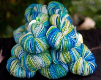 Hand painted Superwash Sock Yarn, 'Splash' colorway, blues, lime green, white