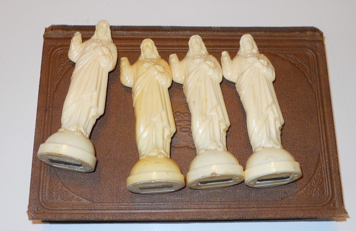 small plastic jesus figurines