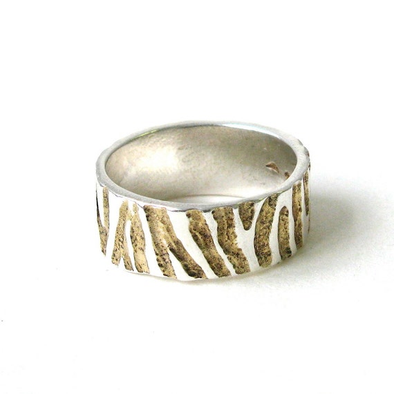 Wide Zebra Ring With Gold Detail.