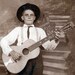 1914 Country WEstern BOy on Guitar photo postcard