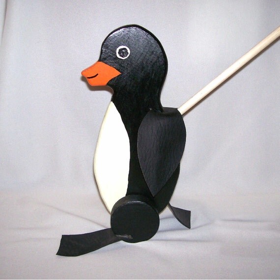 Items similar to Wooden wood penguin walking waddling push toy on Etsy