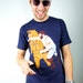 man punching bear t shirt