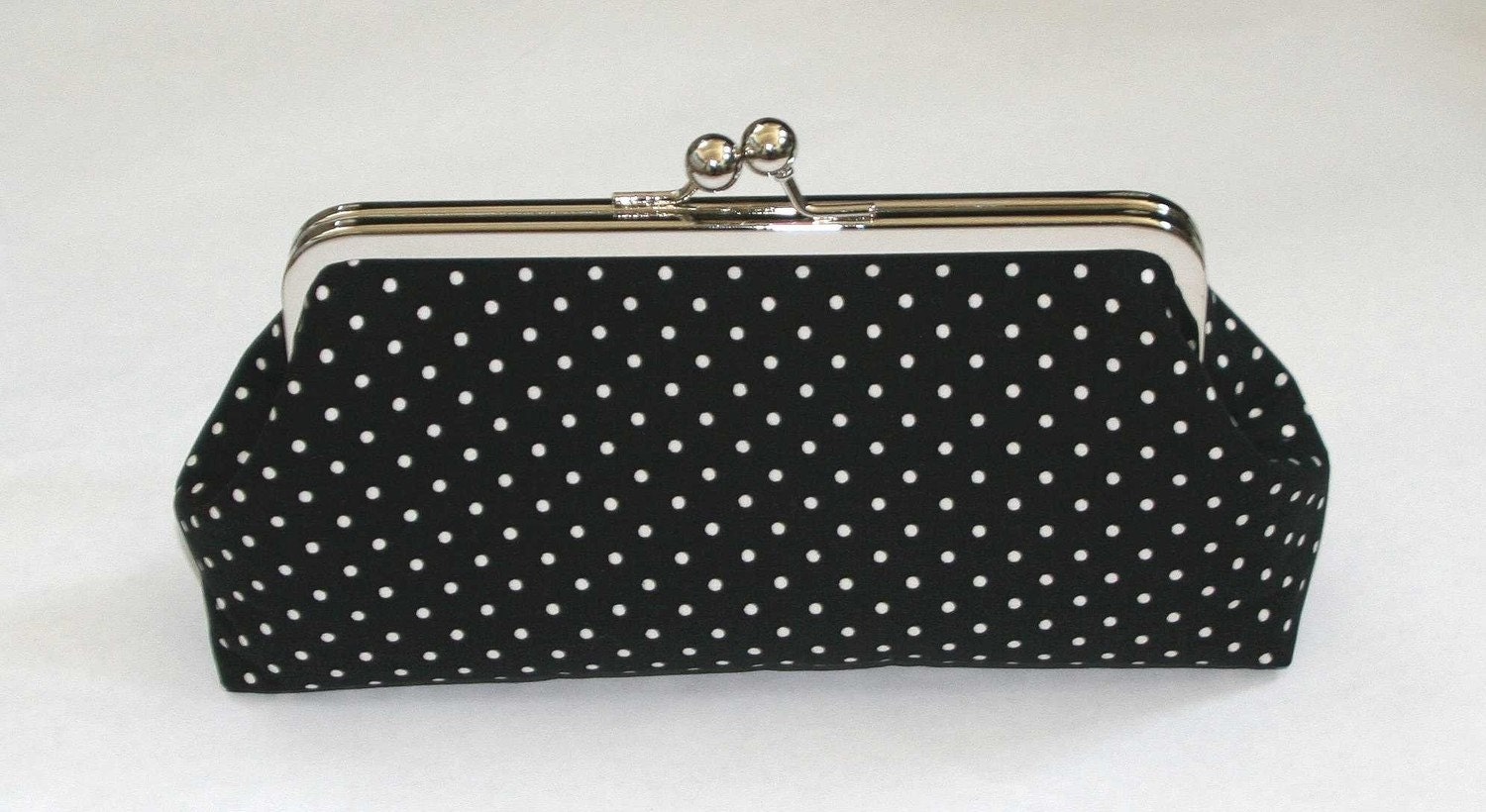 black and white spot clutch bag