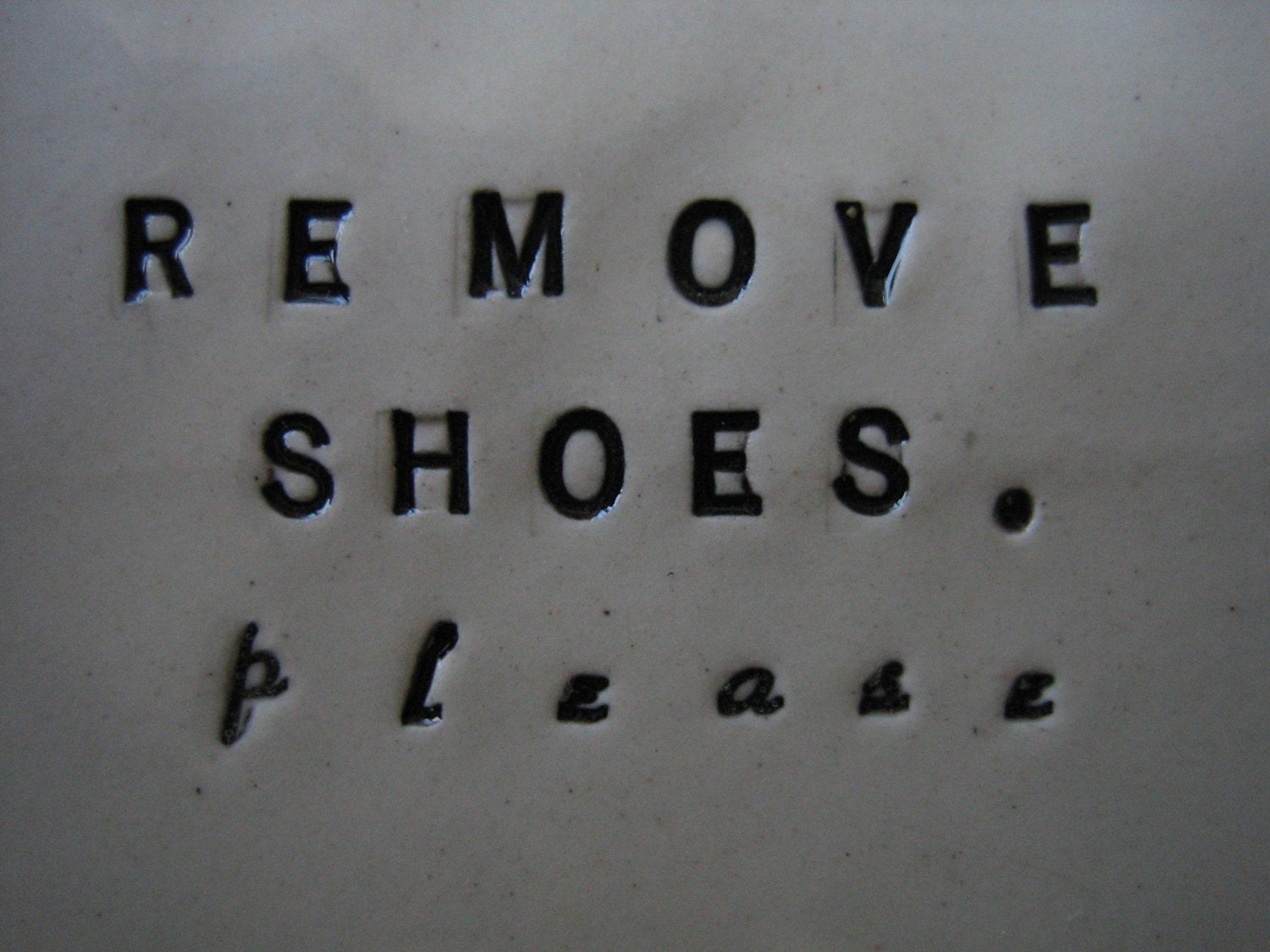 REMOVE SHOES plaque boot