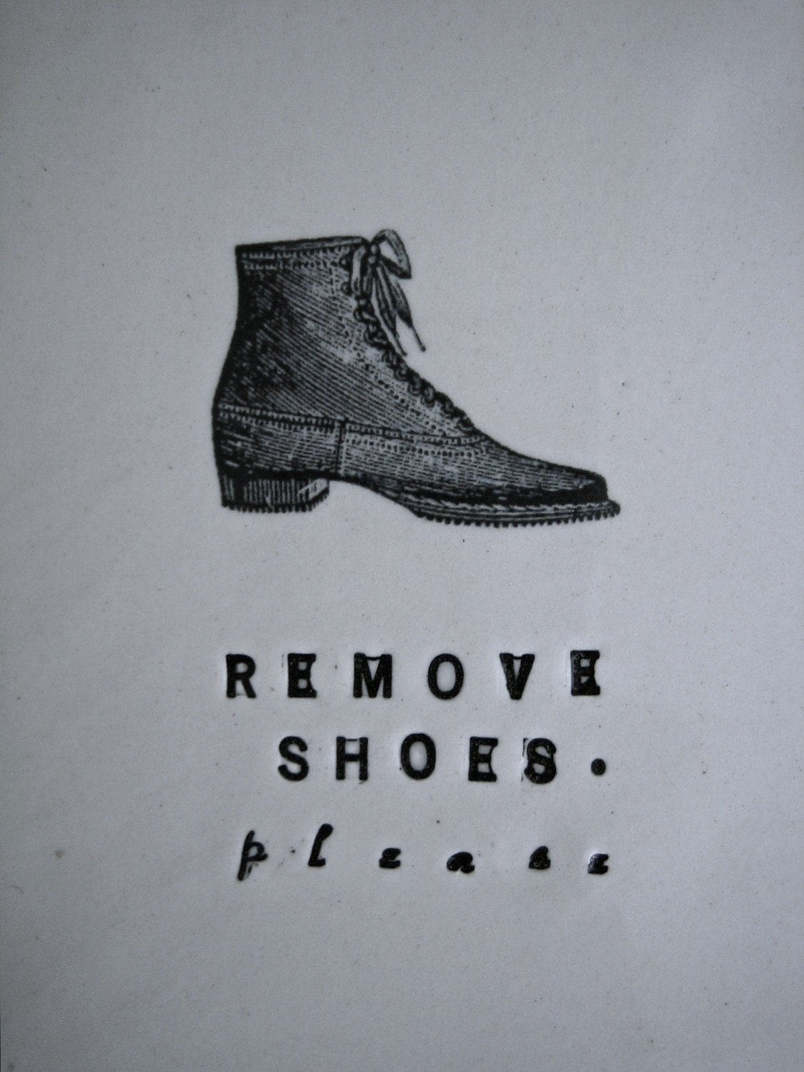 REMOVE SHOES plaque boot