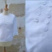 1960 white nylon blouse with little flowers daisys size S