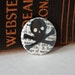 Little Skull and Crossbones on a Vintage Dictionary Page, One-Inch Pinback Button