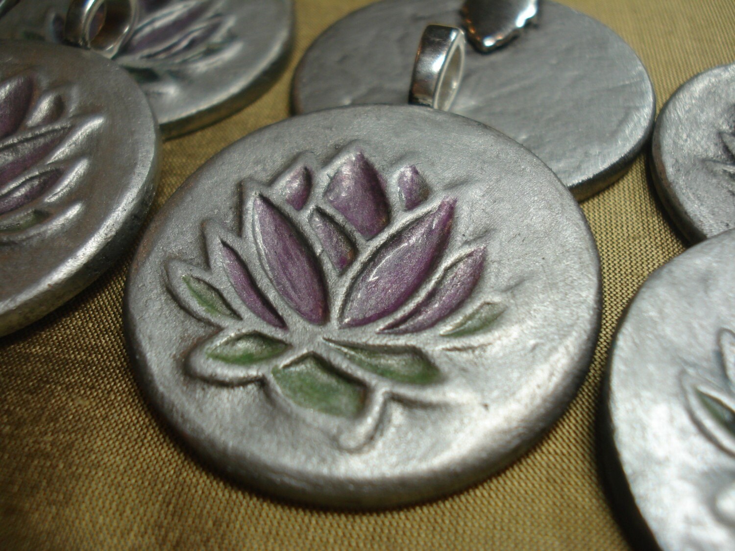 Lotus Pendant symbol of beauty strength and challenge
