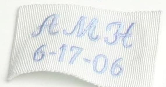 Monogrammed wedding dress label.