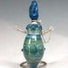 Atlantis perfume vessel pendant Made by Fyrsmith in Alaska lampwork boro glass