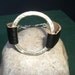 silver circle and leather bracelet