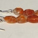 petite sparkly sunstone oval stones pierced dangle hand made wire wrapped earrings