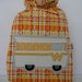 Yellow Winnebago Toy Bag on orange plaid/green lining