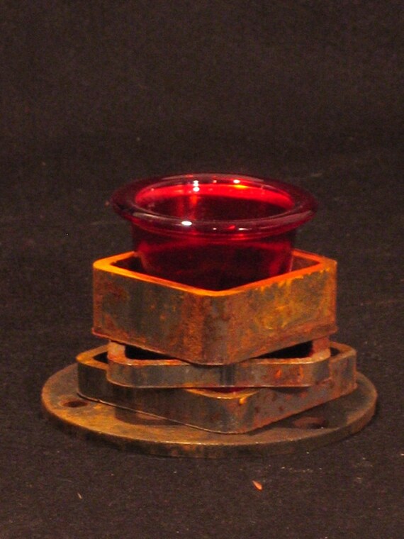 Items similar to salvaged hardware candle holder rusted steel stack on Etsy