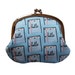 Coin purse with friendly notebook paper on blue