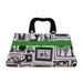 Handbag in black and white gallery with green ribbon accent