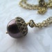 IT FELL FROM A TREE Necklace (Brass with Purple Pearl)
