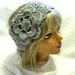 Crochet headwarmer with flower, steel gray, adjustable width