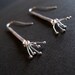 Hydra earrings. long, kinetic, sterling silver.