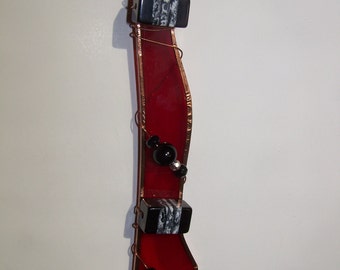 Red suncatcher with black and white square beads