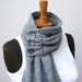 Grey scarf with three buttons
