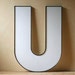 white plastic alphabet letter U initial for wall decor