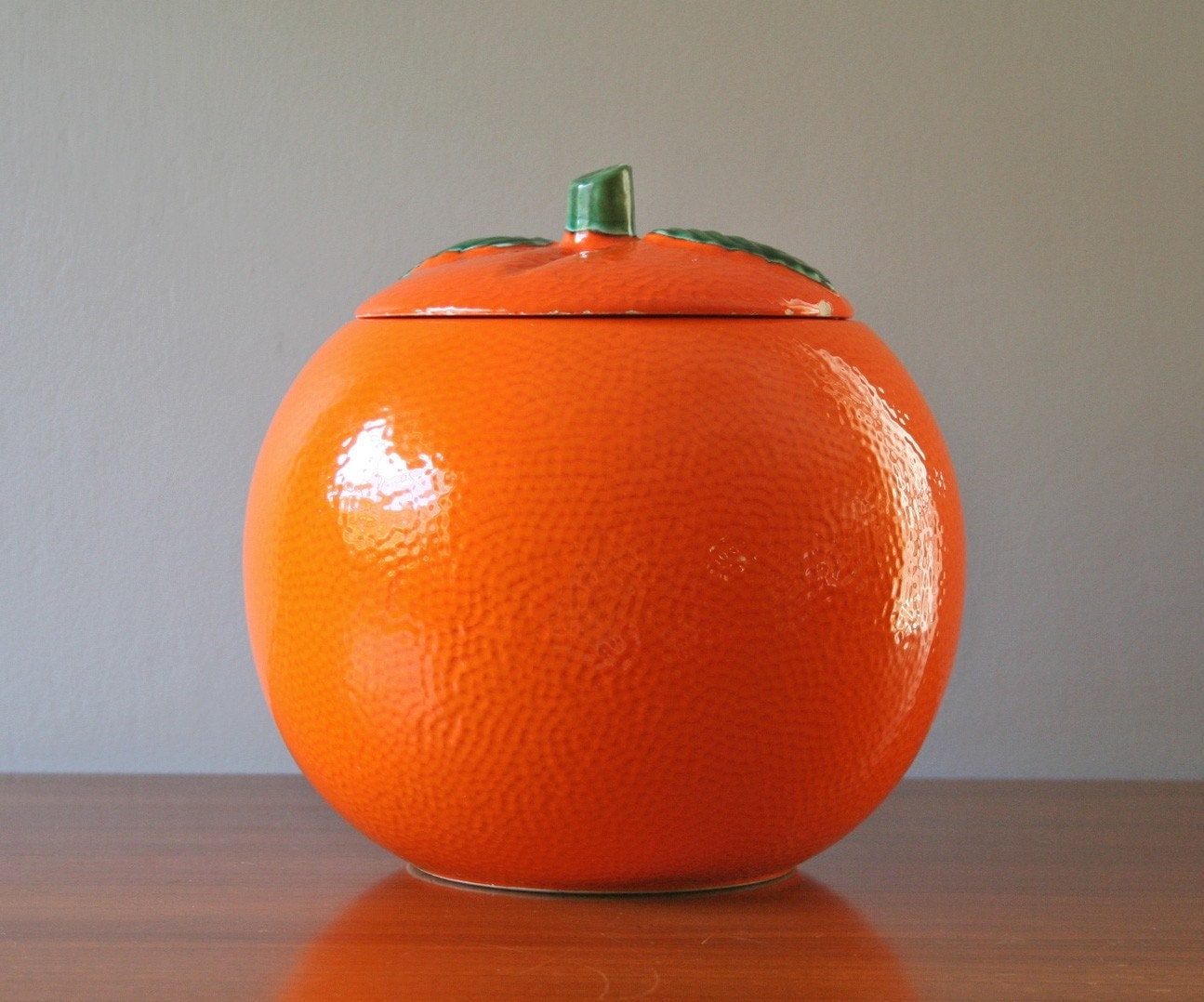 large vintage ceramic orange canister or cookie jar