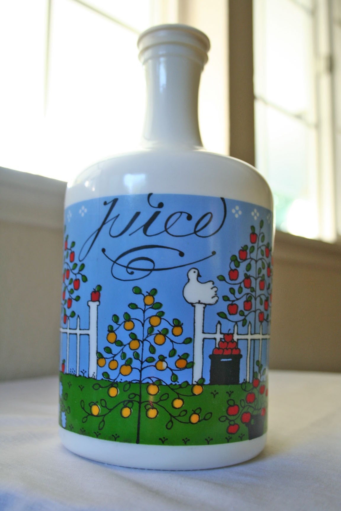 cute glass juice container with lid by ModishVintage on Etsy