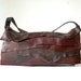Dark brown leather shoulder bag with natural layered front, handmade.