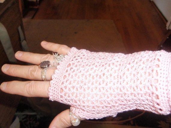 I designed these lacy fingerless gloves.