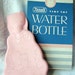 Cat Water Bottle Vintage Kuddle Kitty Pink Rexall Drugs 1950