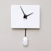 Clock made from a recycled Apple ibook G4 computer case