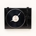 Clock made from a recycled Fischer turntable