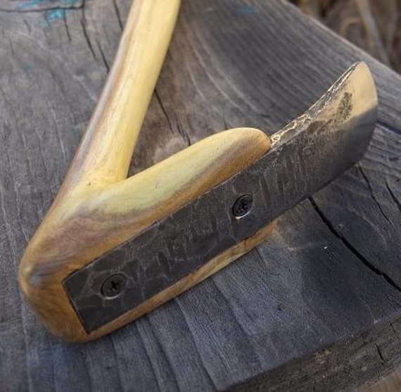using an adze using an adze
