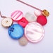Sunrise - Button bib necklace in pink, red, white, blue and gold