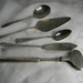 Vintage flat ware - butter knife, cake slice, spoons and olive picker -